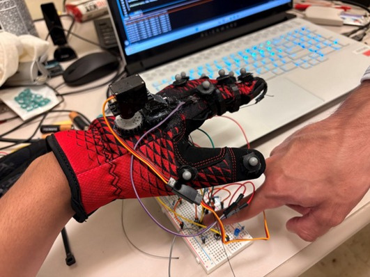 Prototype VR haptic glove with electronics and sensors